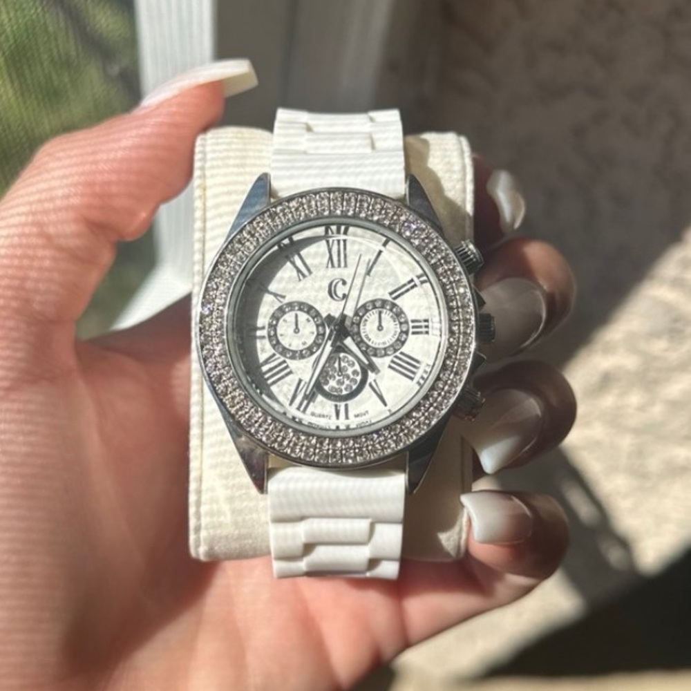 White and silver watch